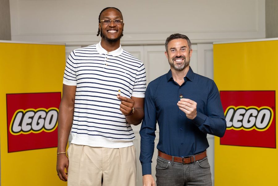 Myles and a LEGO representative at the LEGO Americas Conference
